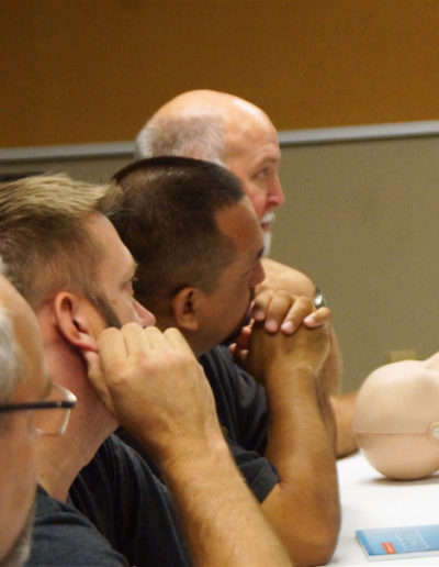 Image of CPR students paying close attention to training