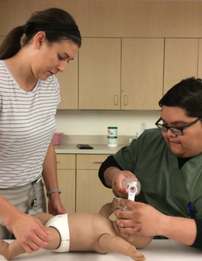 Photo of infant CPR - bagging the infant