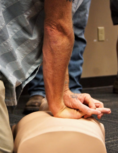 Photo of CPR Student doing chest compressions