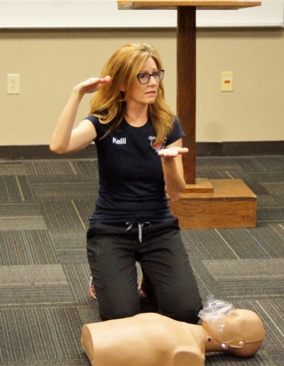 Photo of Instructor explaining CPR to students