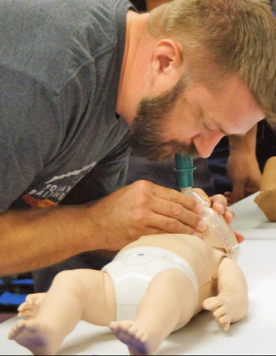 Photo of CPR Student administering infant CPR breaths