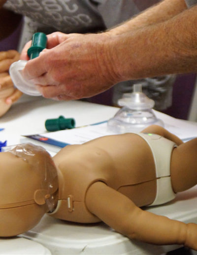 Photo of students learning infant CPR training