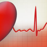 Image of heart superimposed on electrocardiogram graph